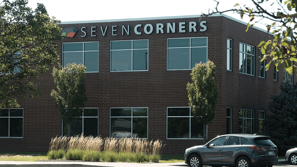 Brick building with the words Seven Corners on it