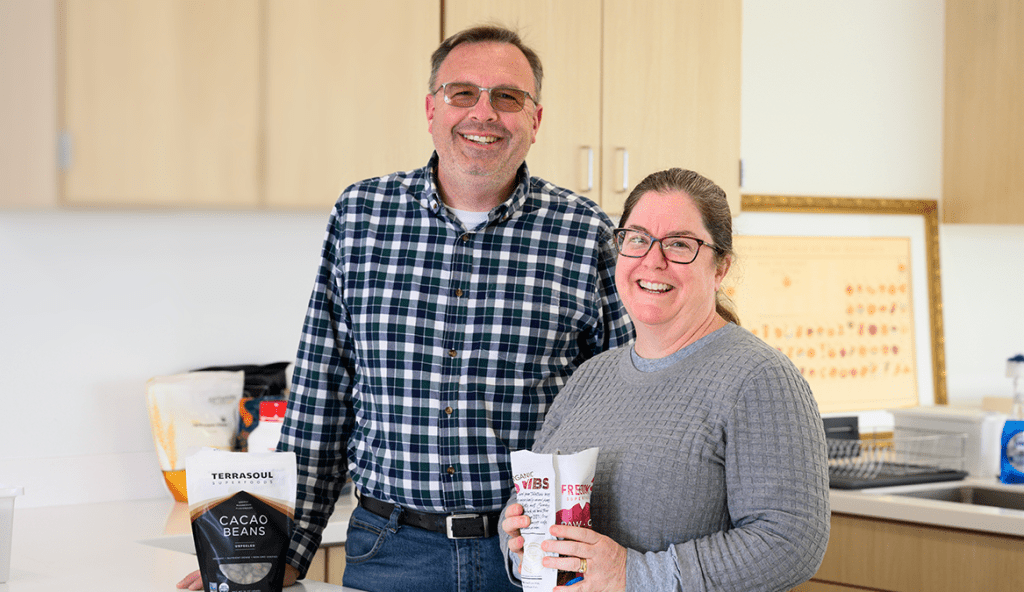 Professors Anne Wilson and Mike Samide in kitchen area with ingrediants