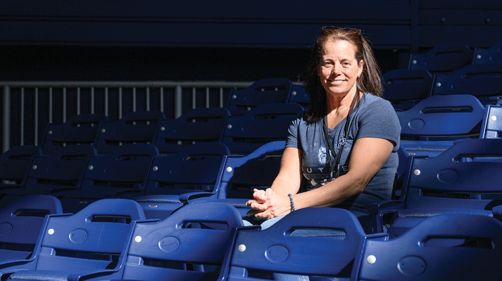 Mary Shaw in the stands of Hinkle Fieldhouse wearing a Butler t-shirt