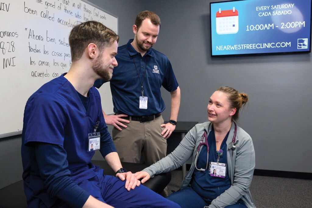 Image of Butler University students in a clinic setting