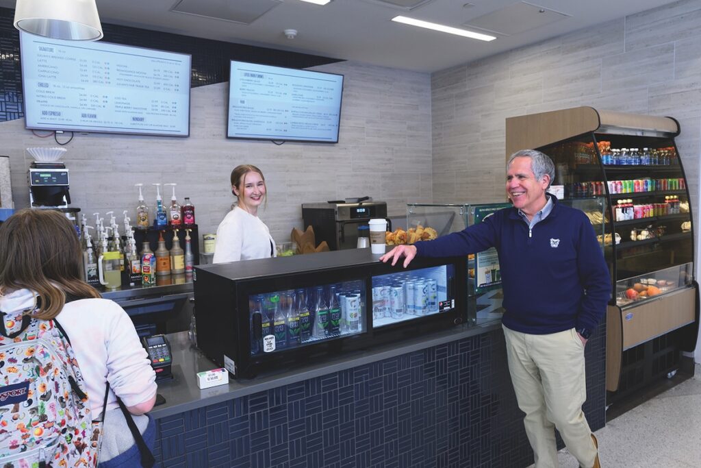 Picture of James Danko, Butler University President, speaking with student workers