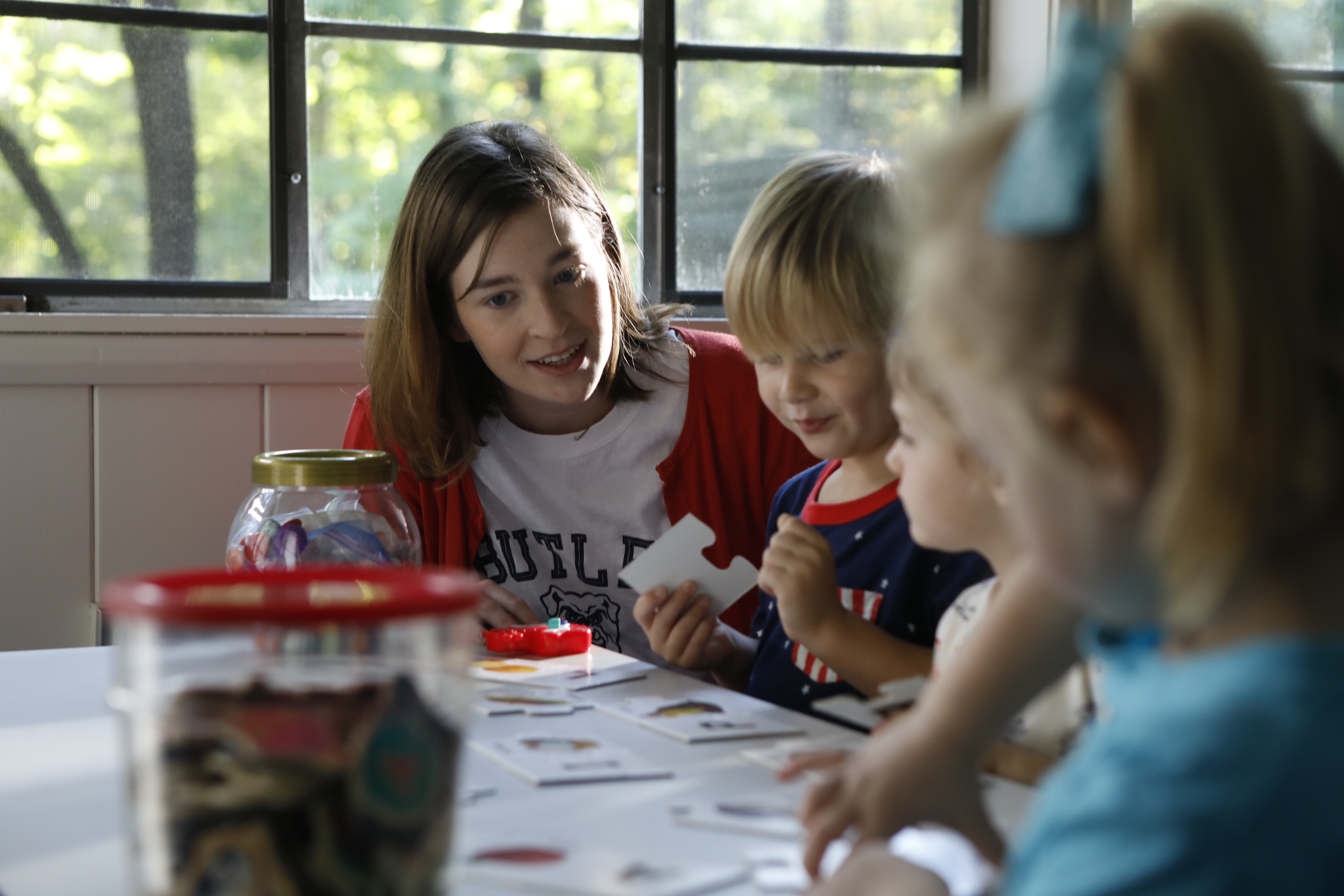 student teaching three young children