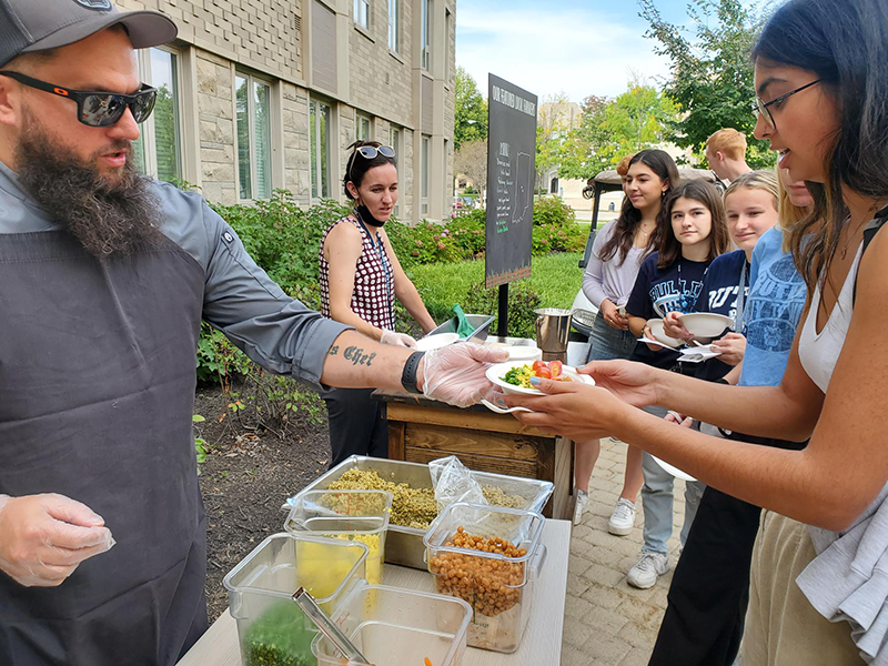 Chef Chad serving food