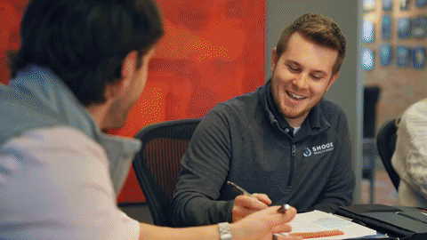 A gif of several clips of Mork Productions' videos, with the footage featuring contexts such as business and events.