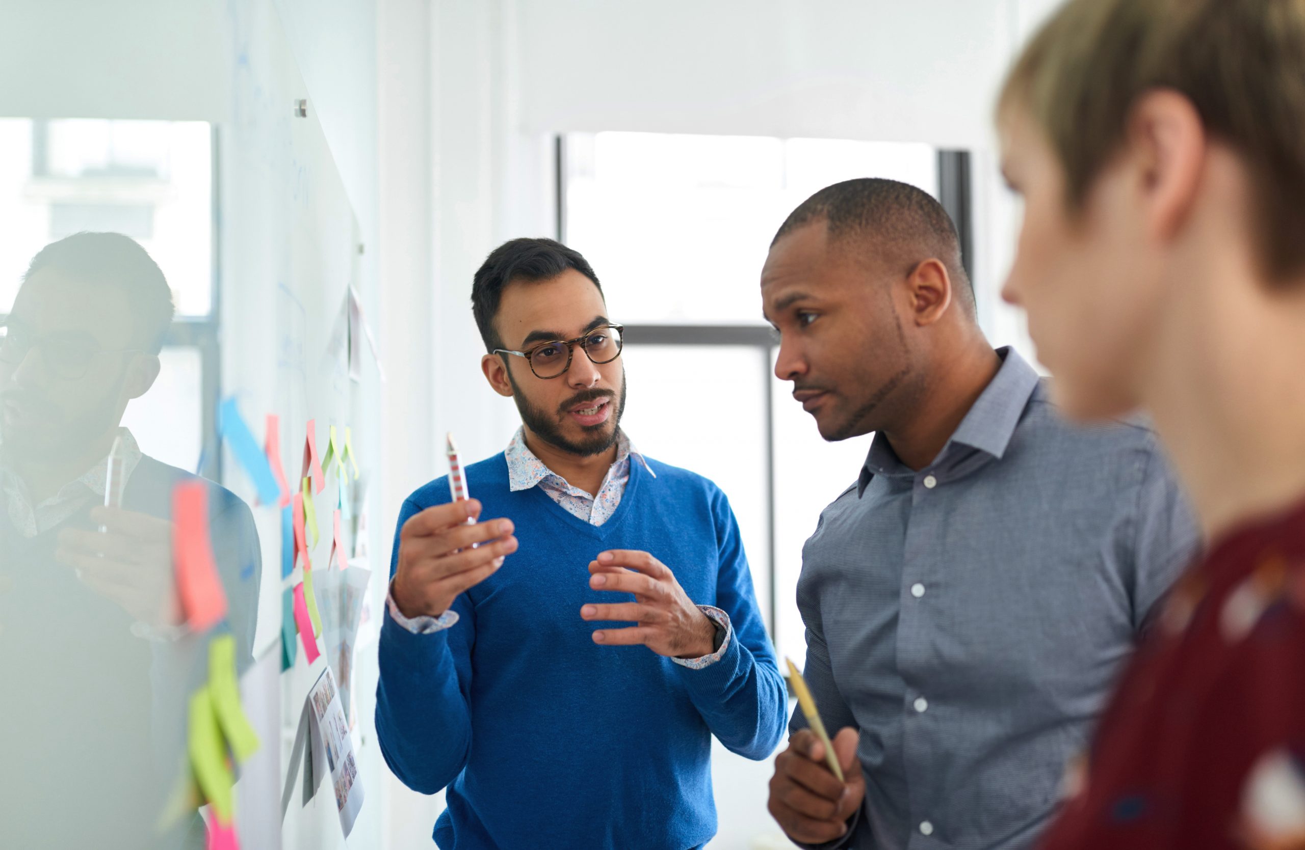 using a whiteboard and sticky notes to plan