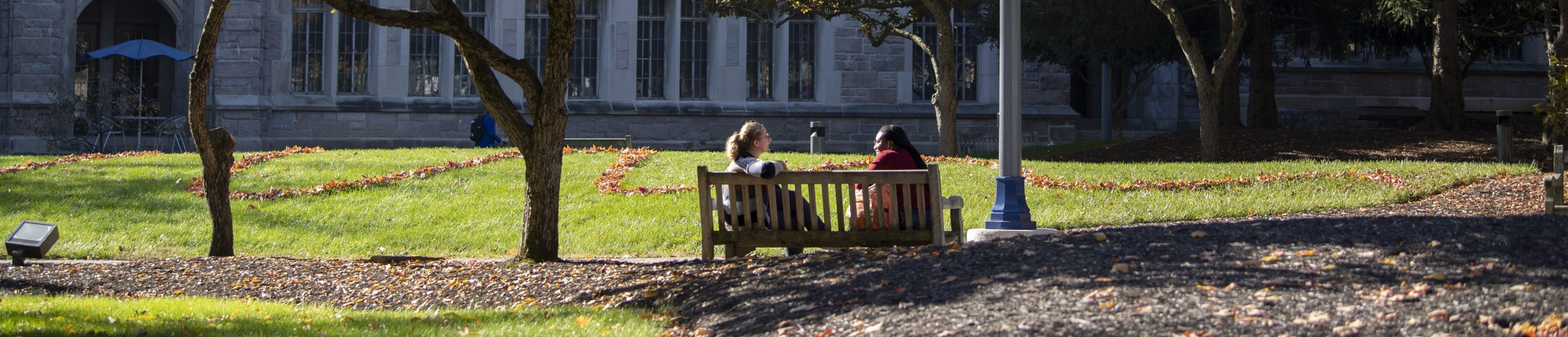 students talking on campus