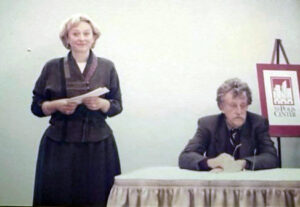 Kurt Vonnegut sits at table beside Butler Professor and Writing Series Founding Member Susan Neville.
