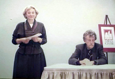 Kurt Vonnegut sits at table beside Butler Professor and Writing Series Founding Member Susan Neville.