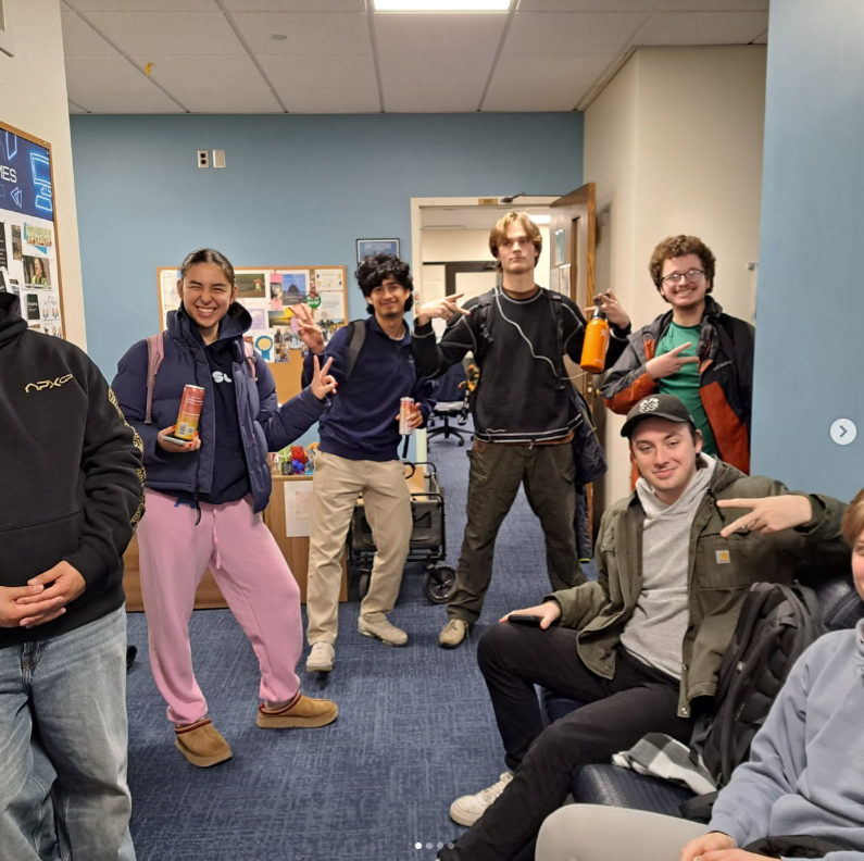 Student in the CSSE office suite psyching themselves up for final exams