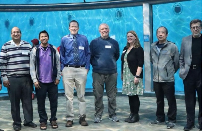 CSSE faculty at the dolphin pavilion, Indianapolis Zoo