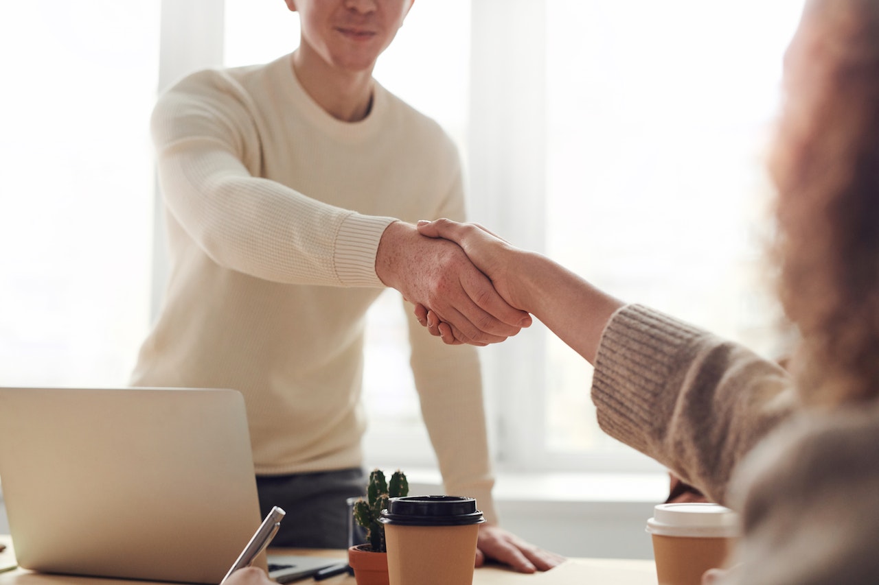 Coworkers shaking hands
