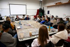 arts students having a meeting