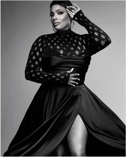 DJ Spinderella in black dress.