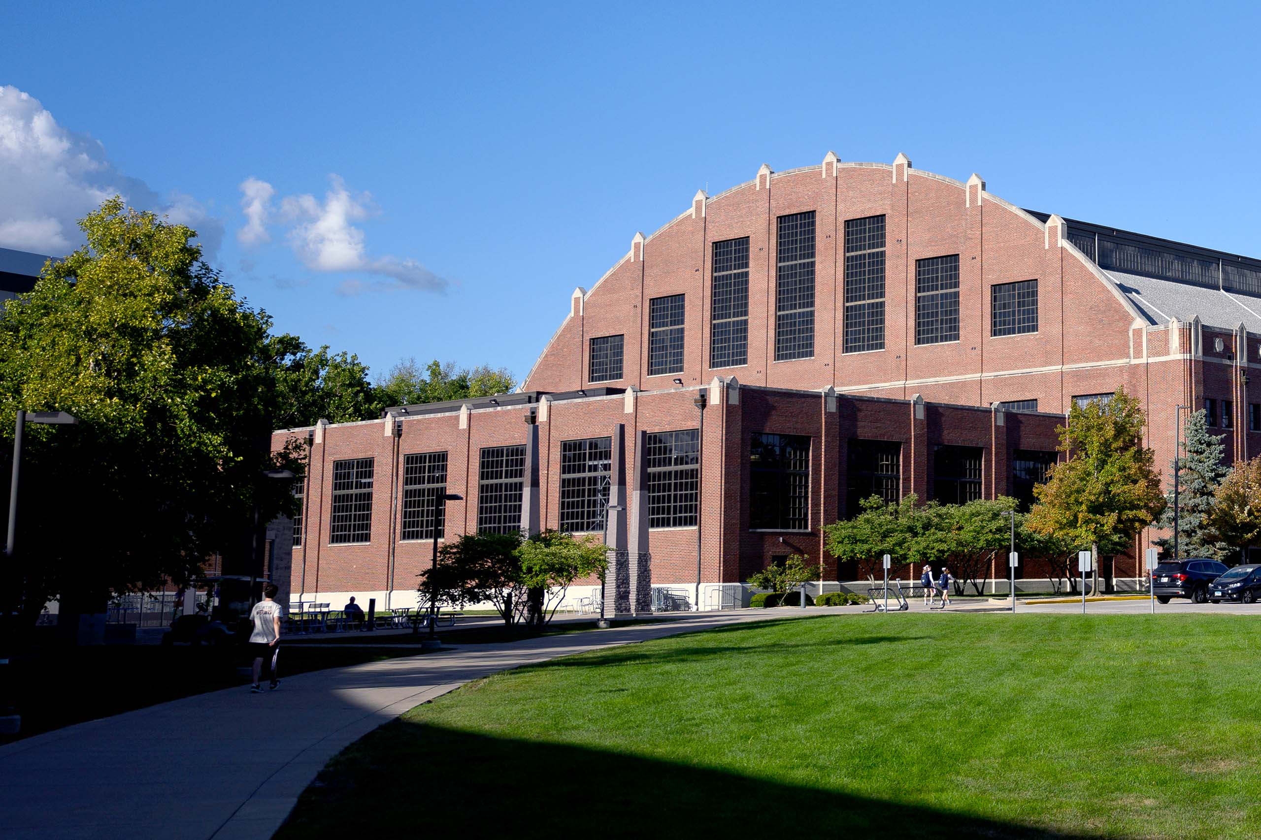 Brick exterior on the west side of Hinkle Fieldhouse on a sunny day.