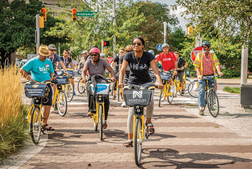 students riding bikes together