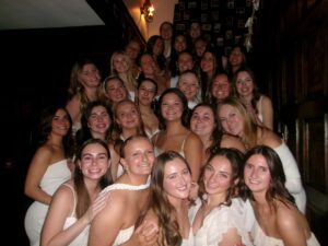 Group of women during recruitment, stacked on stairs