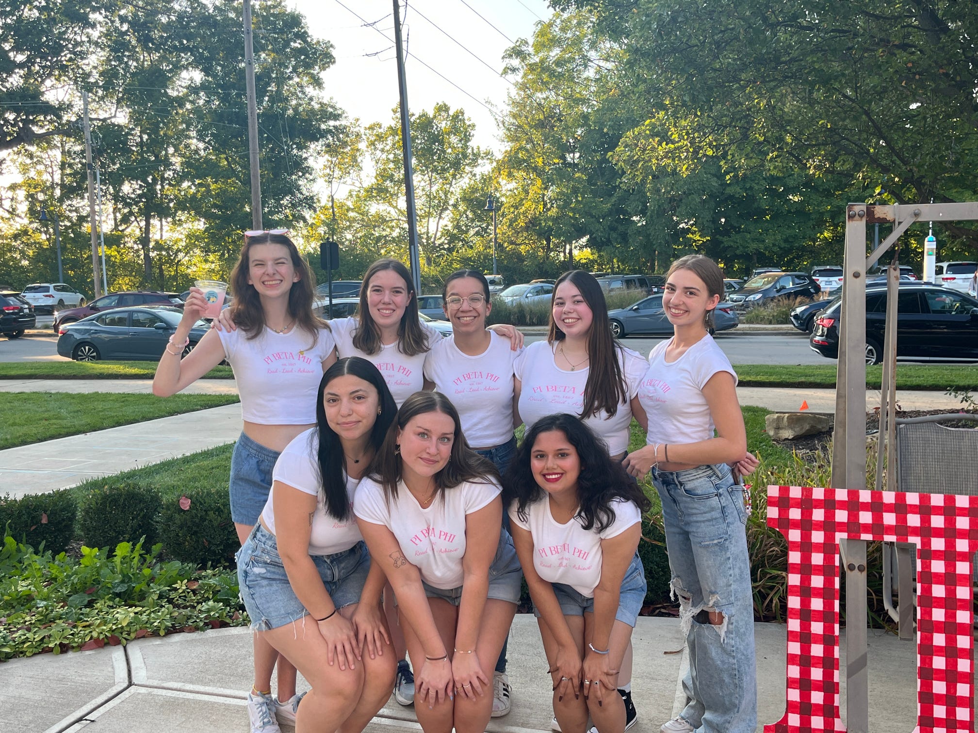 Group of women outside of house for philanthropy event