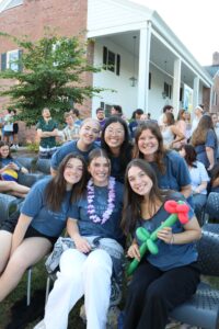 6 women outside the house during philanthropy event