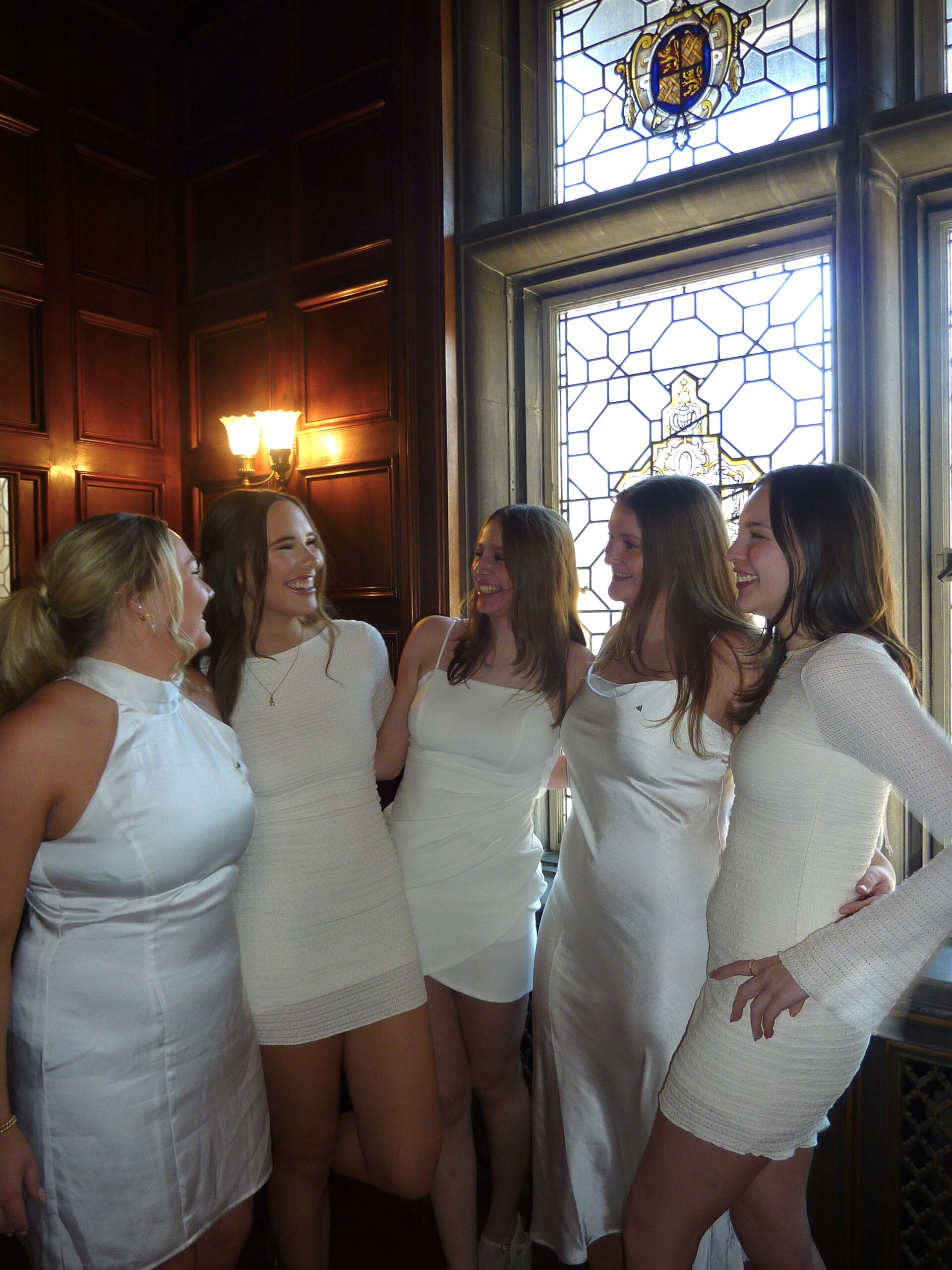 5 sisters laughing during recruitment
