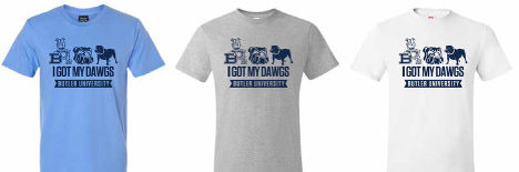 "I got my dawgs. Butler University." text and bulldog illustrations printed on a T-shirt, shown with three shirt color options of blue, gray, and white.