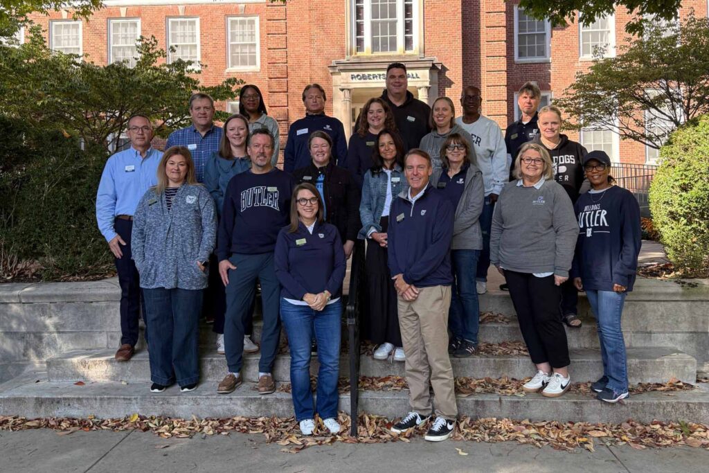 Members of the family council (fall 2025) gathered on the steps outside of Robertson Hall.