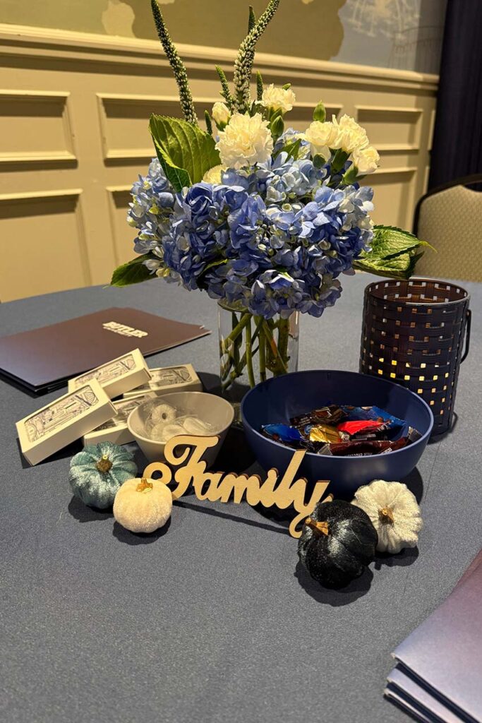 Table decorations setting at family council meeting.