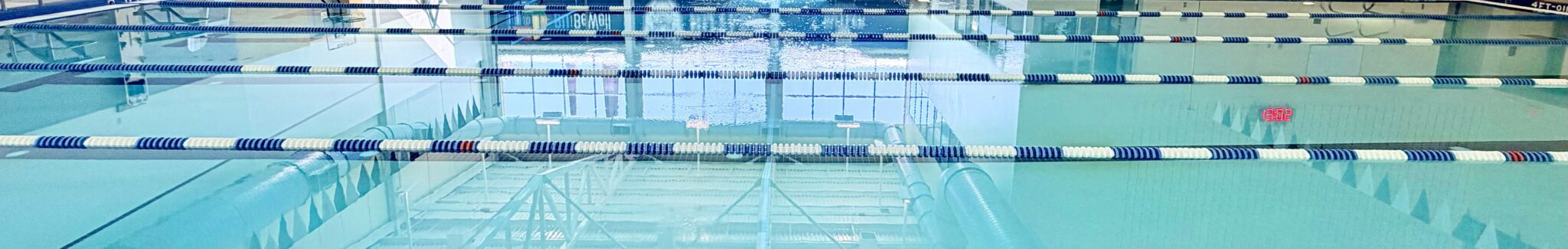 Swimming pool with lane dividers.