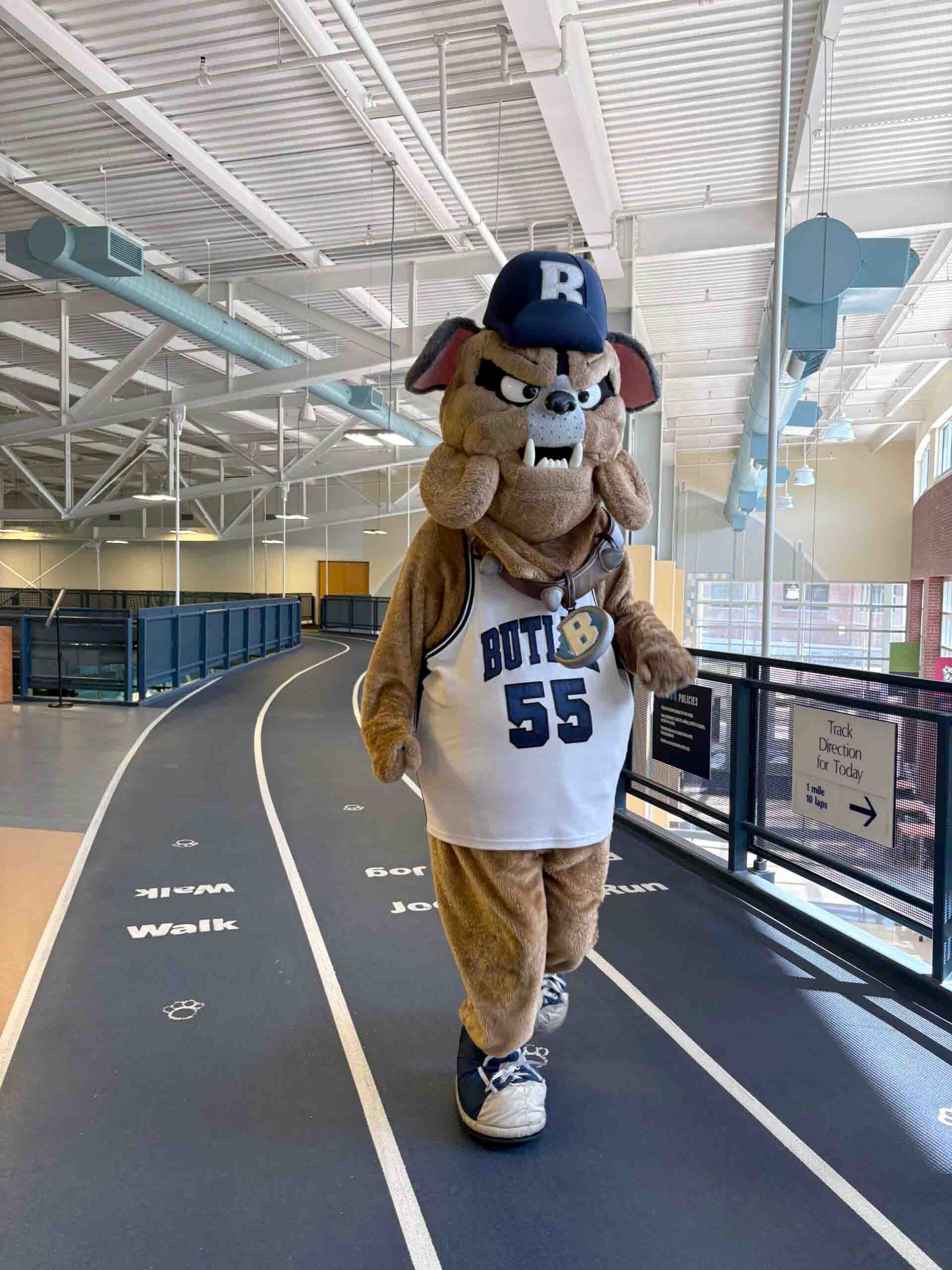 Butler mascot Hink jogging on running track in the Health and Recreation Complex.
