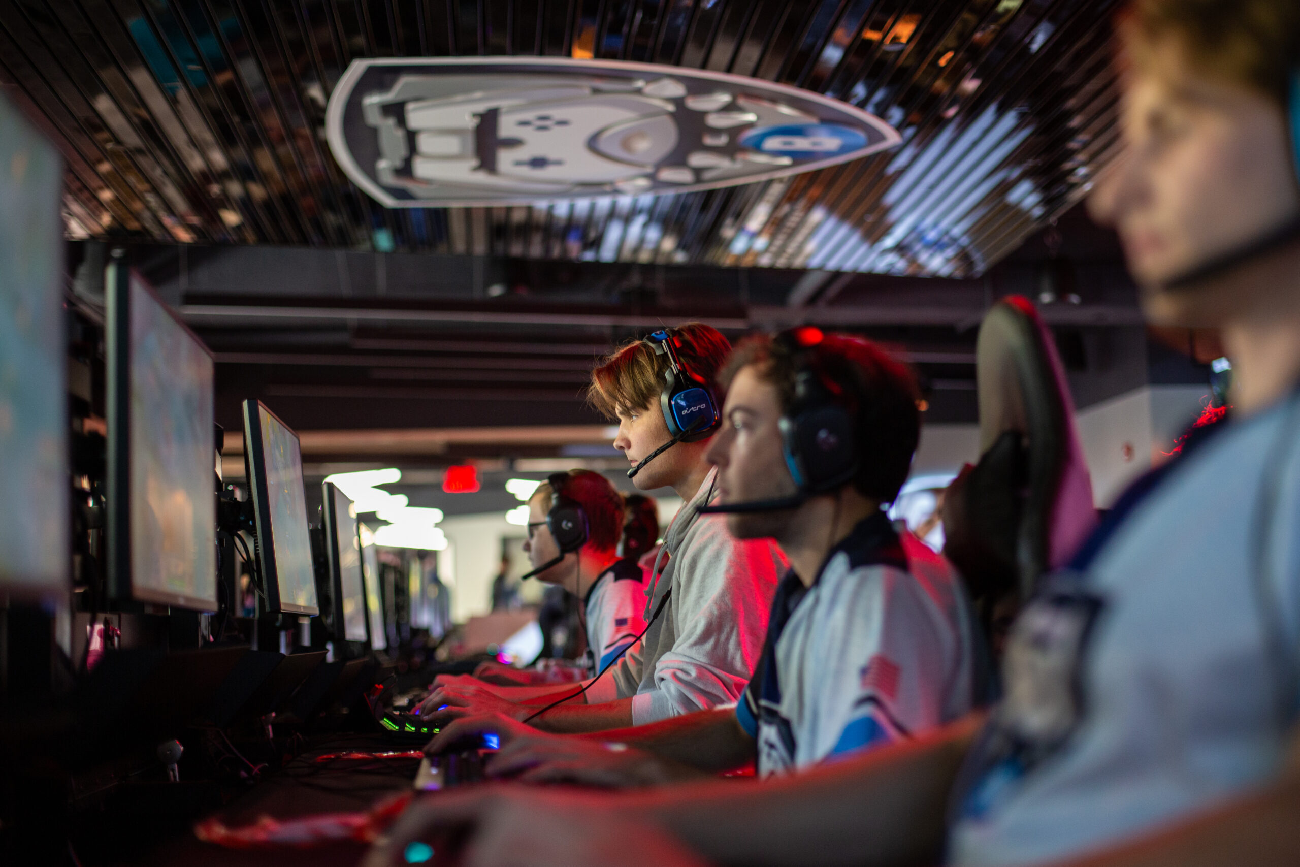 side view of gamers playing