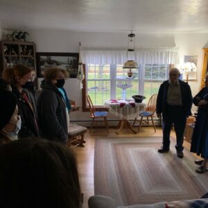 students and teachers in a house