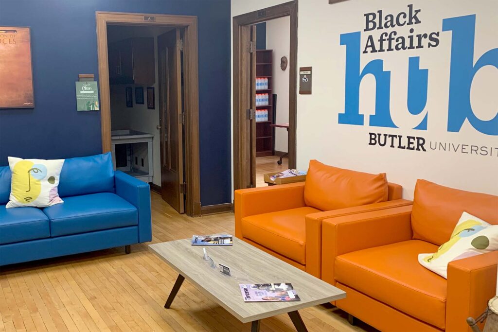 Offices of Black Affairs Hub, with coffee table and couches in a waiting room outside the office spaces.