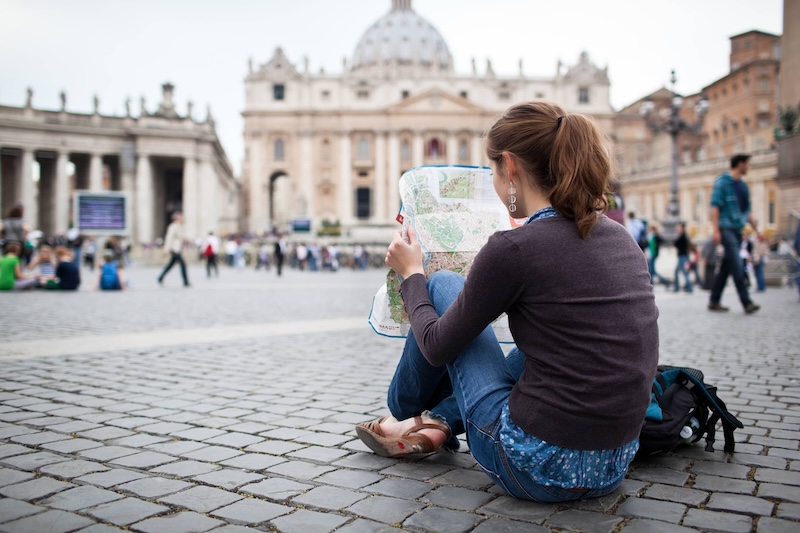 Image of a student with a map