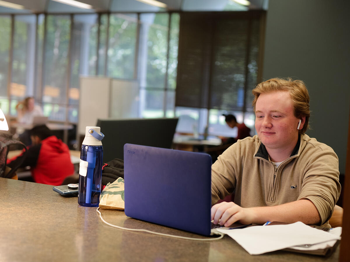 Student at his laptop