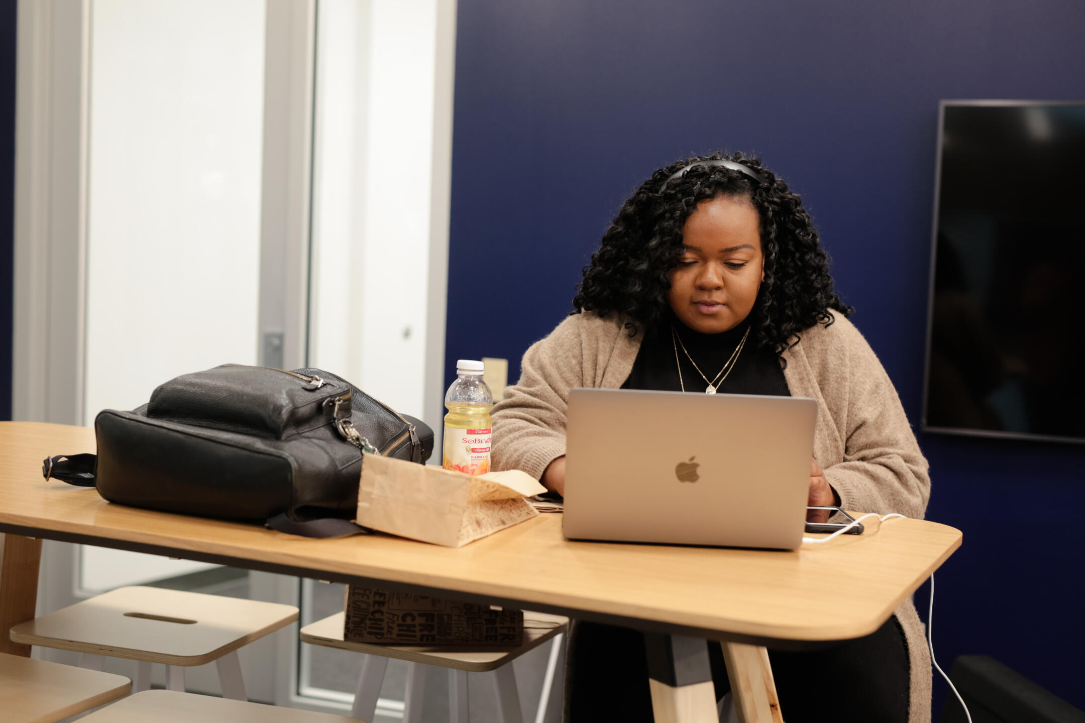 Female student working on her laptop