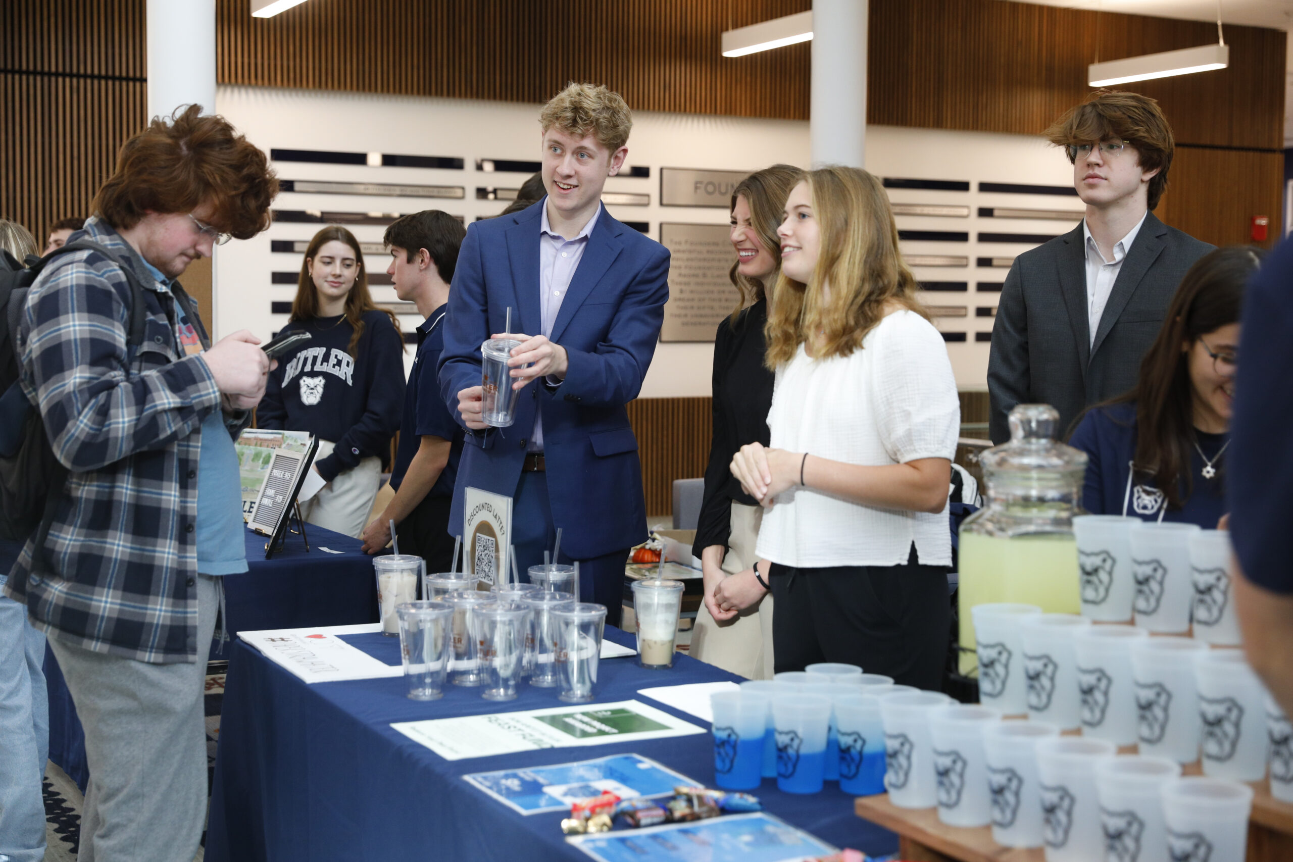 Group of students showcasing their business projects