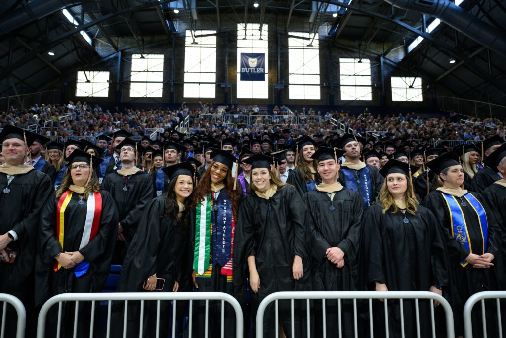 Butler students in cap and gowns.