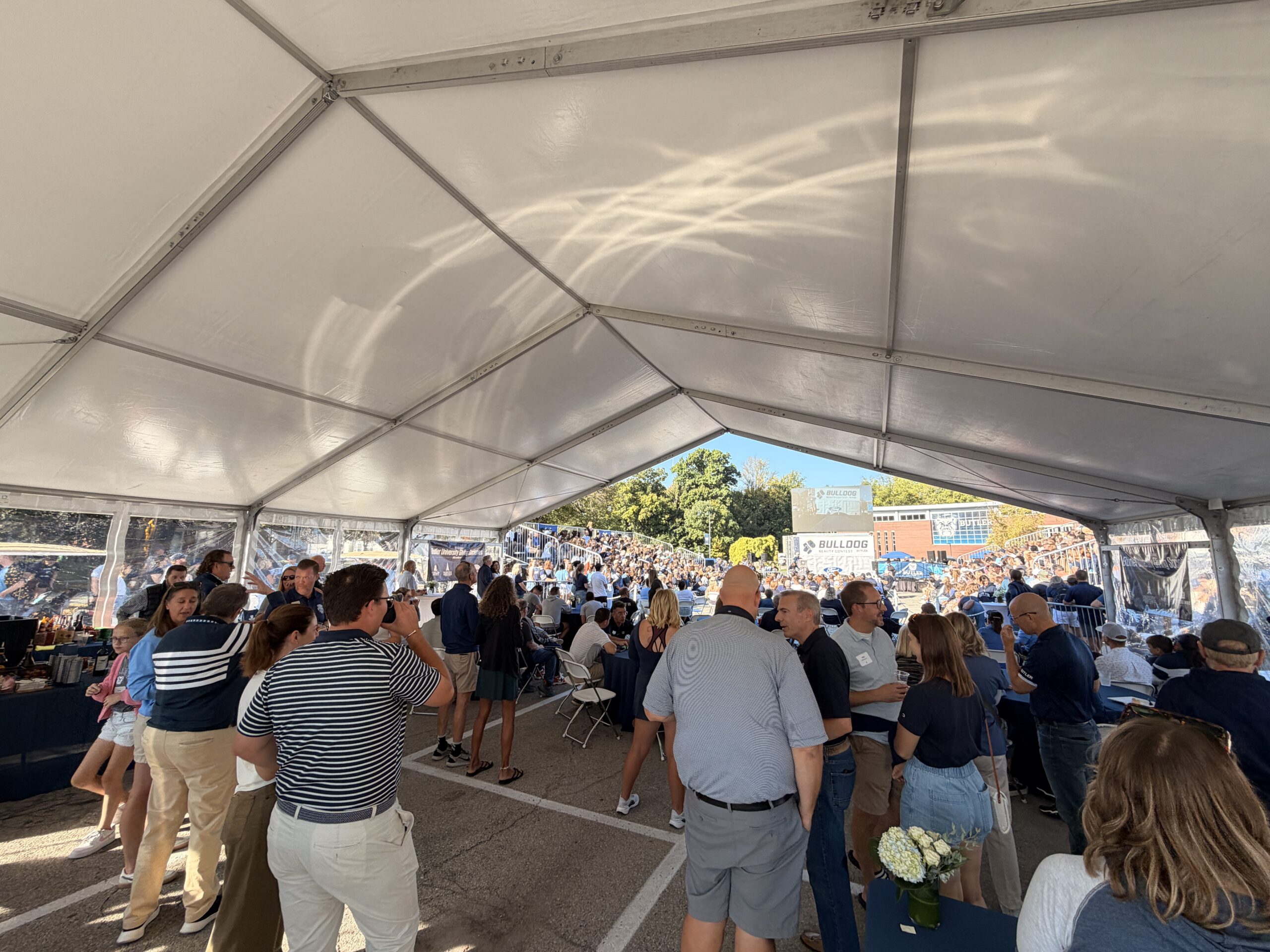 An image of giving society members seated at Hink's Huddle