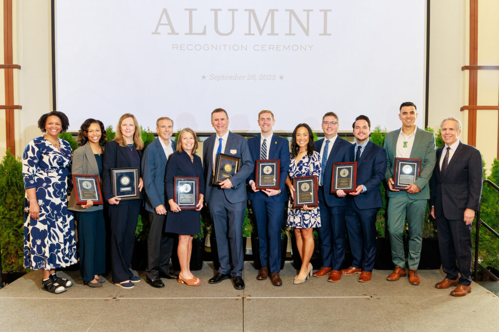 A group photo of the 2025 Alumni Association Alumni Award Honorees with President James Danko and BUAA President Delia Harris